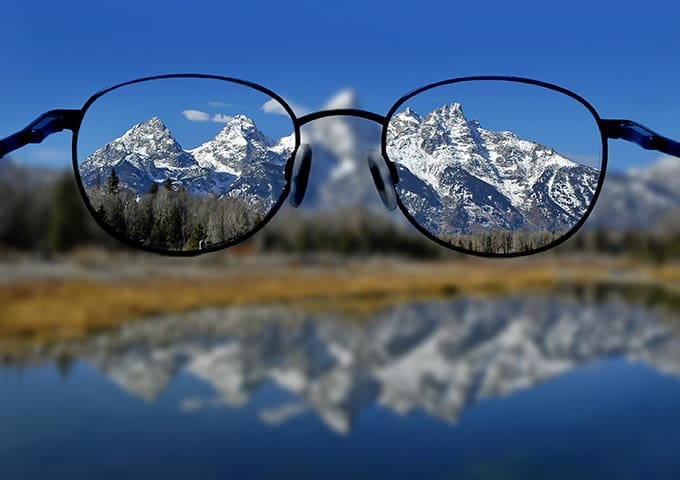 glasses view of mountains in the distance