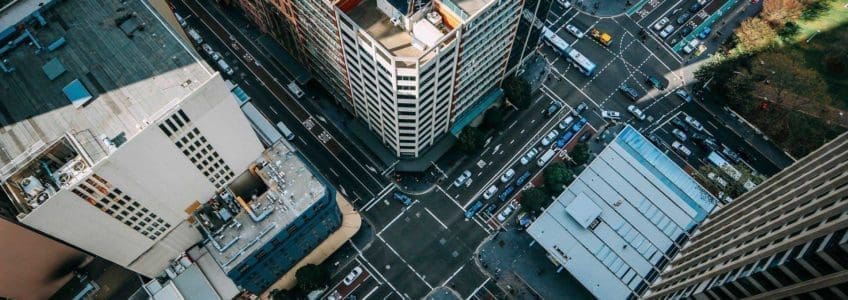 Mergers & Acquisitions Management/Cost Avoided Case Study 84 view down of a city street and cars