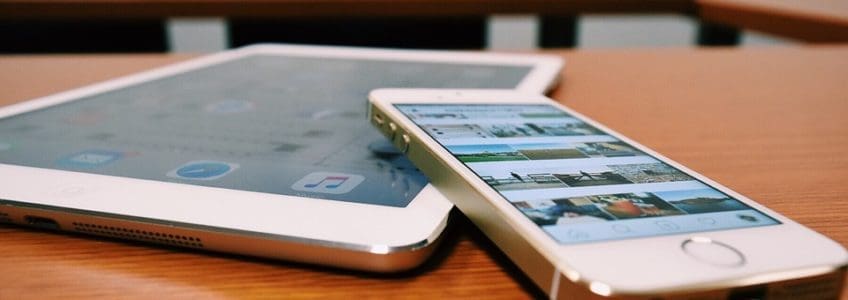 Wireless Discovery and Optimization Saves $830K Annually 46 phone and tablet device sit on table