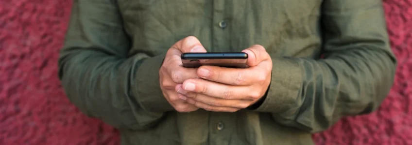Why is Mobile Device Management Important? 13 close up man s hand using cellphone