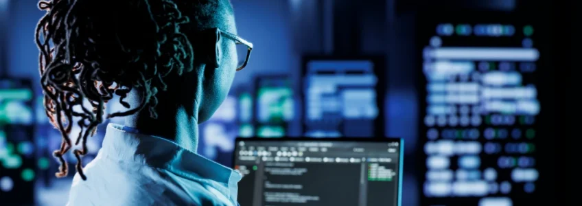 15 Effective Ways to Reduce IT Costs for Businesses 10 data center technician runs code