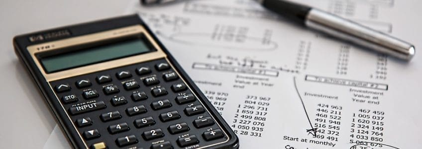 Department Integration & Optimization Part 1: Accounts Payable 27 calculator pen and investment paperwork