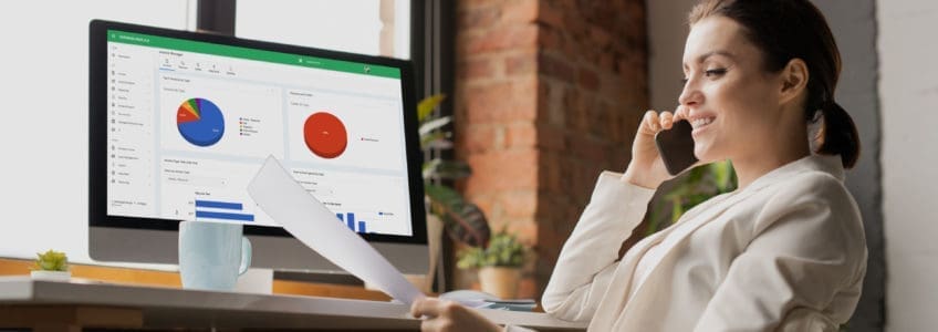 RadiusPoint Launches New Website To Support Enterprise Operations 14 businesswoman smiles and reviews analytics