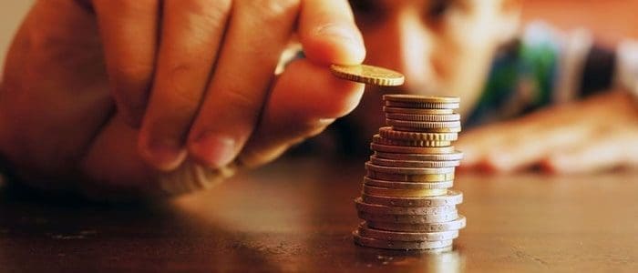 5 Strategies That Will Help Reduce Telecom Expenses 13 money saving stacking coins
