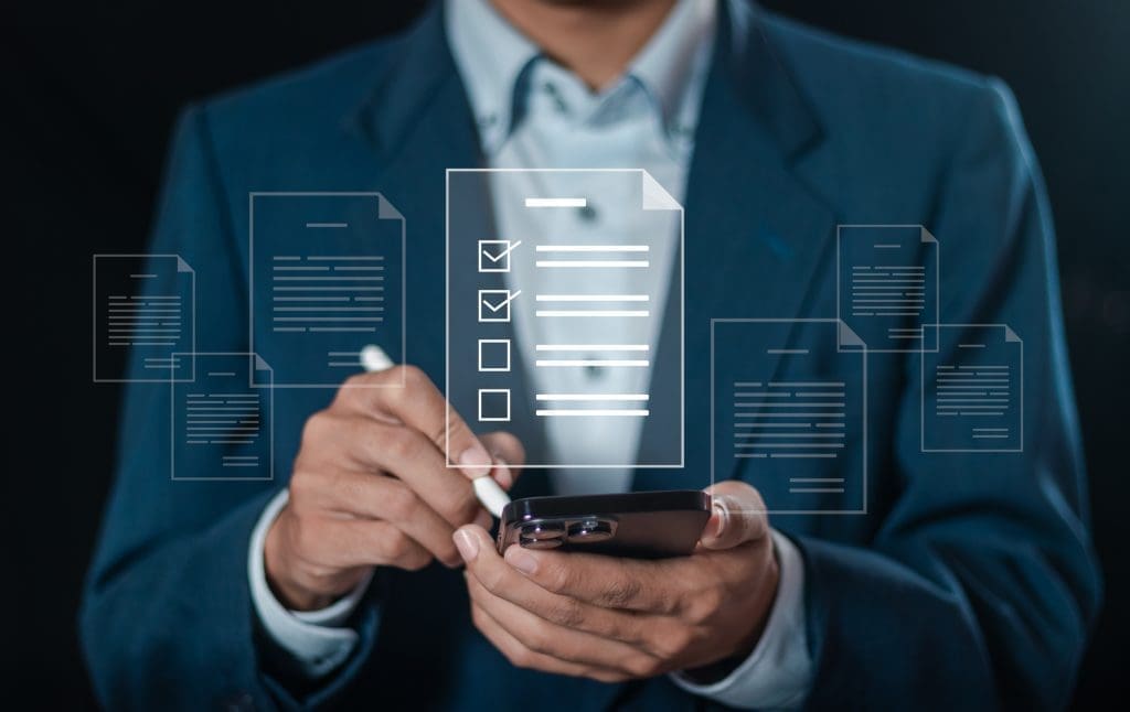 Telecom Expense Management Solution | RadiusPoint 1 Checklist concept. Businessman use smartphone